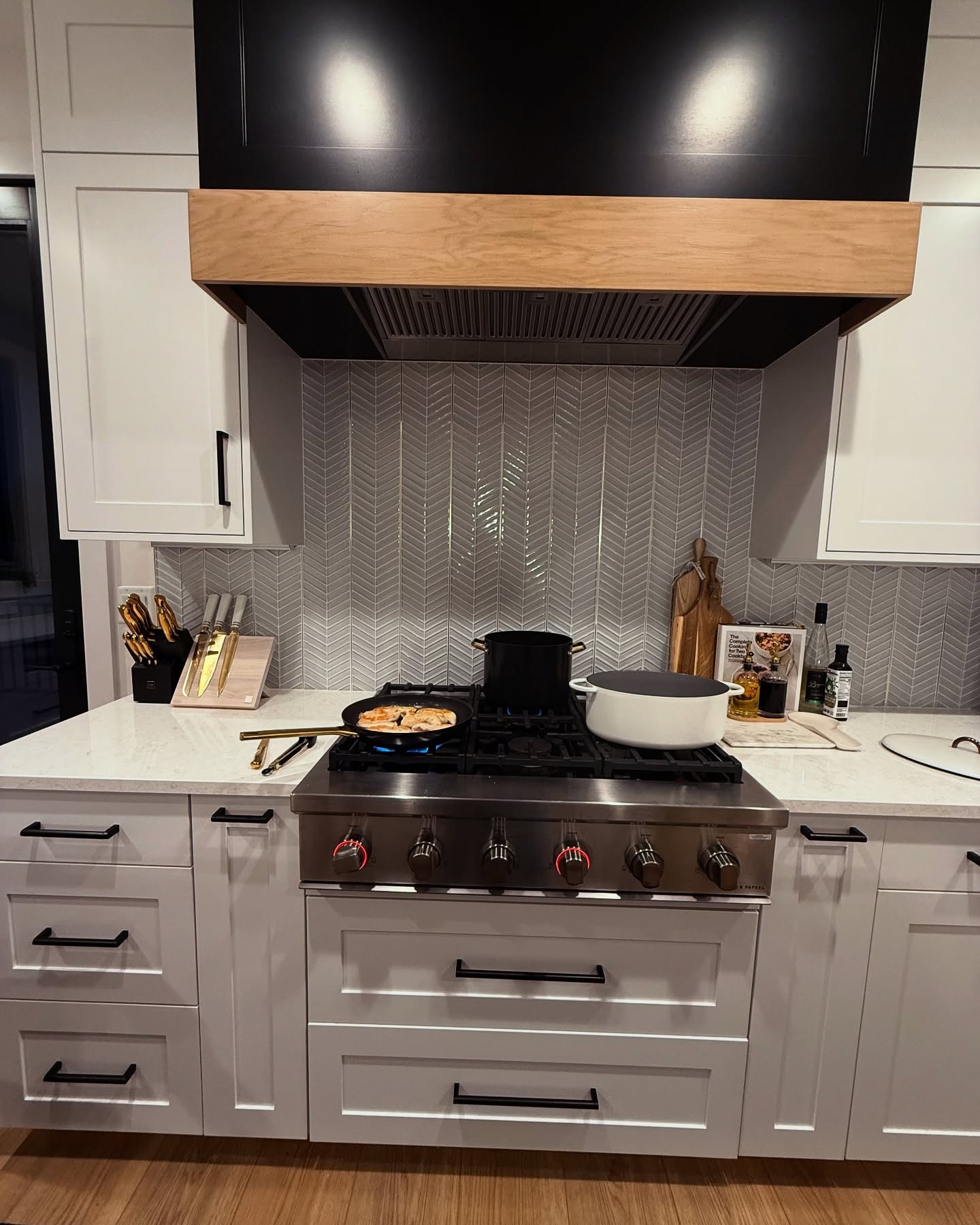 Our kitchen is all about functionality! On each side of the stove, we have a spice drawer and a utensils drawer making easy access when cooking. Although we didn’t put a pot filler above the stove, we do have a separate sink right across. Below the stove we have two drawer for pots and pans! Make sure to save this to help my your kitchen more functional! 

#functionalkitchen #homekitchen #kitchendesign #kitchen finds 

#LTKHome #LTKFamily