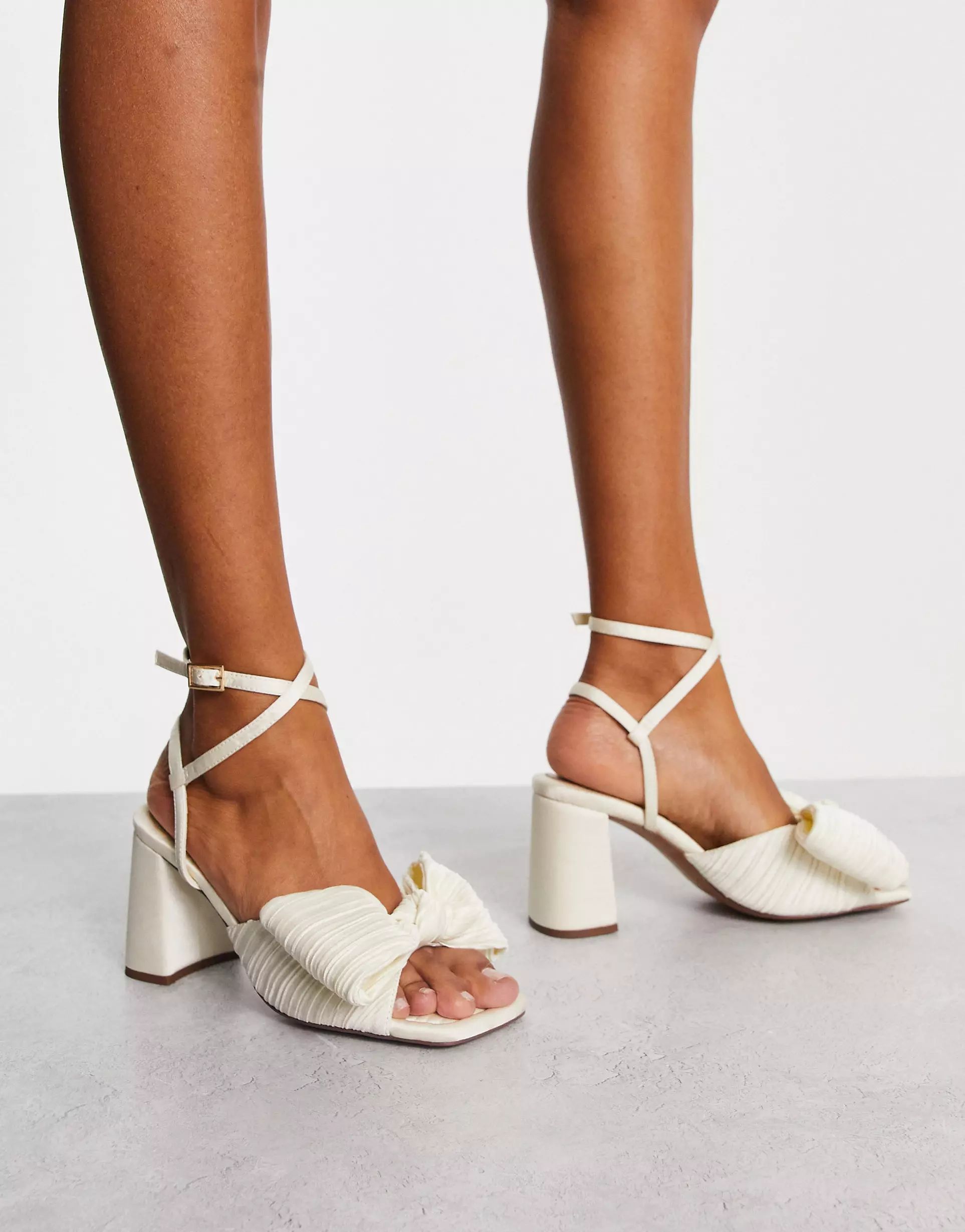 ASOS DESIGN Hitched bow detail mid heeled sandals in ivory | ASOS (Global)