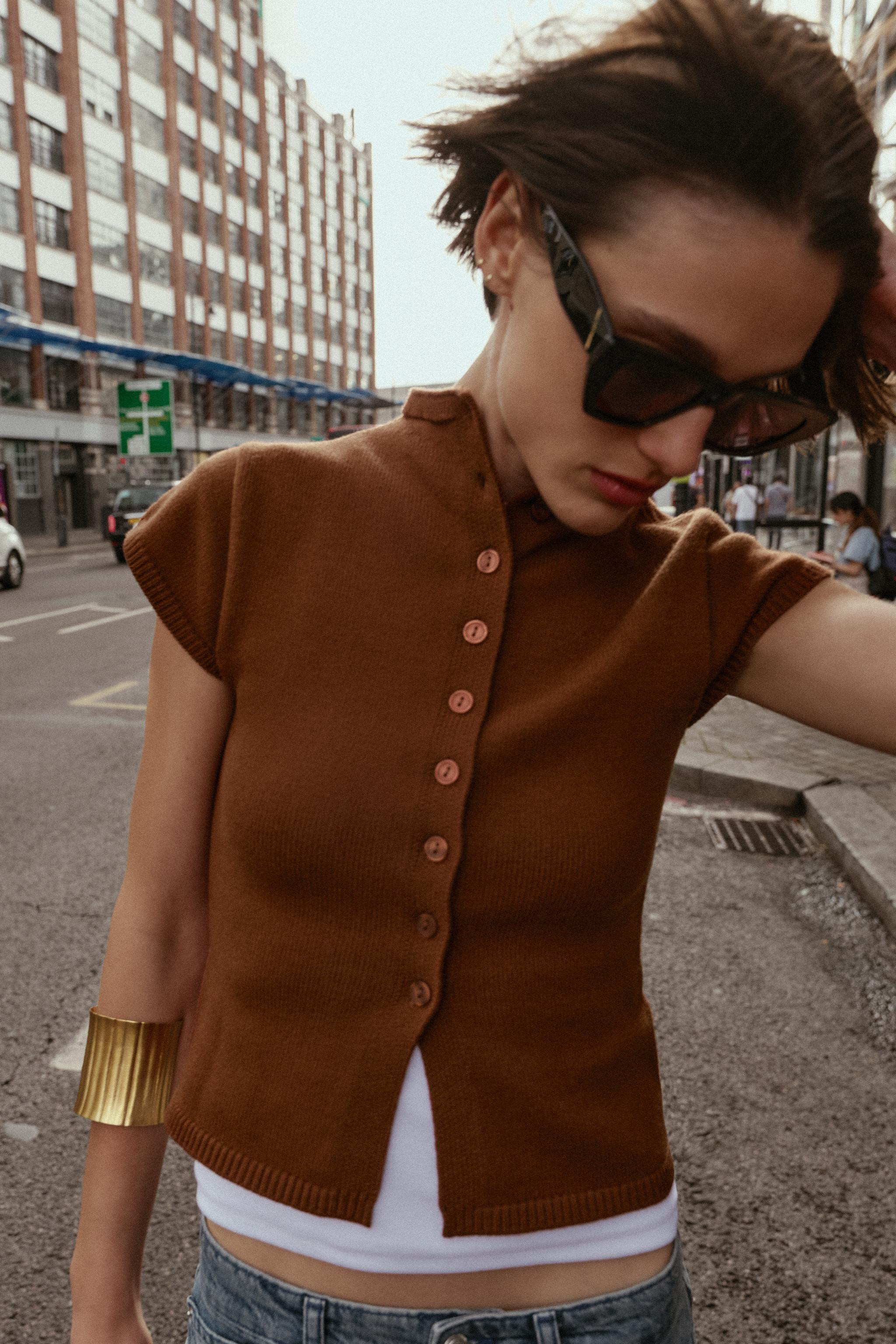 BUTTONED KNIT TOP$ 45.90Brown | 5536/160/700Add to cartAddRound neck top with dropped armholes. F... | Zara US