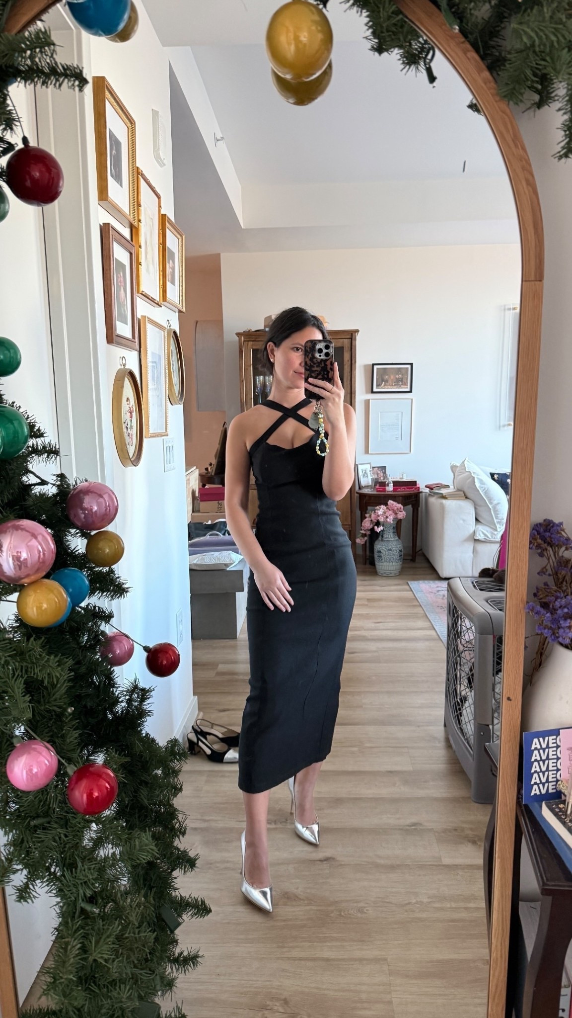 @tuckernuck nye outfit idea black dress silver heels 

#LTKHoliday #LTKPetite