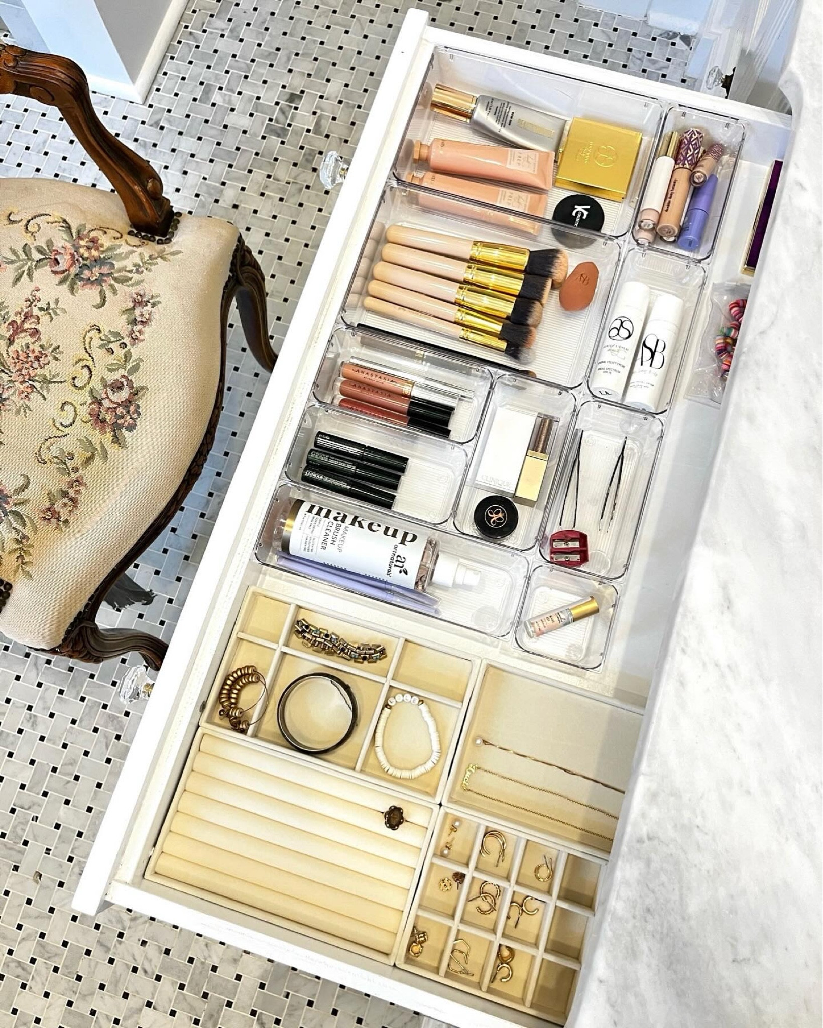 
A streamlined morning routine is in for 2024. Having a designated space for everyday makeup and jewelry was crucial for this busy new mom. Customizing your space to work for your life is our specialty.

#LTKhome #LTKbeauty #LTKSeasonal