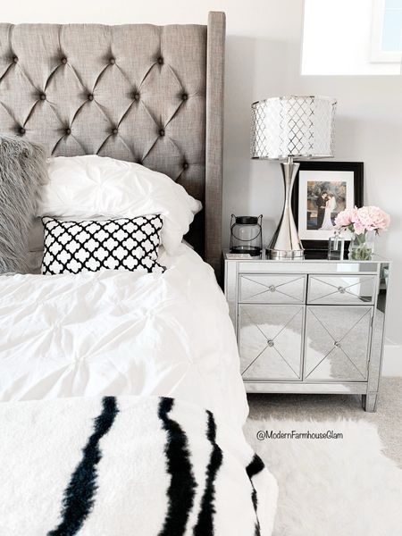 Who else likes keeping the master bedroom neutral? It makes it feel peaceful and calming, do you agree? Nightstand lamp tufted headboard 

#LTKhome