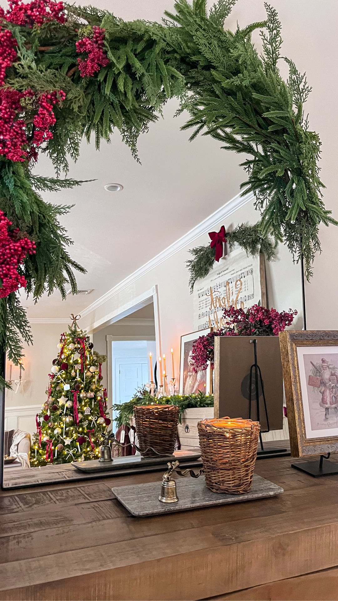 20 more sleeps! Sharing our Christmas entryway!

|Henn console|  |Christmas countdown| |Norfolk & Cypress Garland| |Red berry stems| |Vintage Santa| |Vintage Champagne bucket|| |Simmering cranberry candle| 

#LTKSeasonal #LTKHome #LTKHoliday