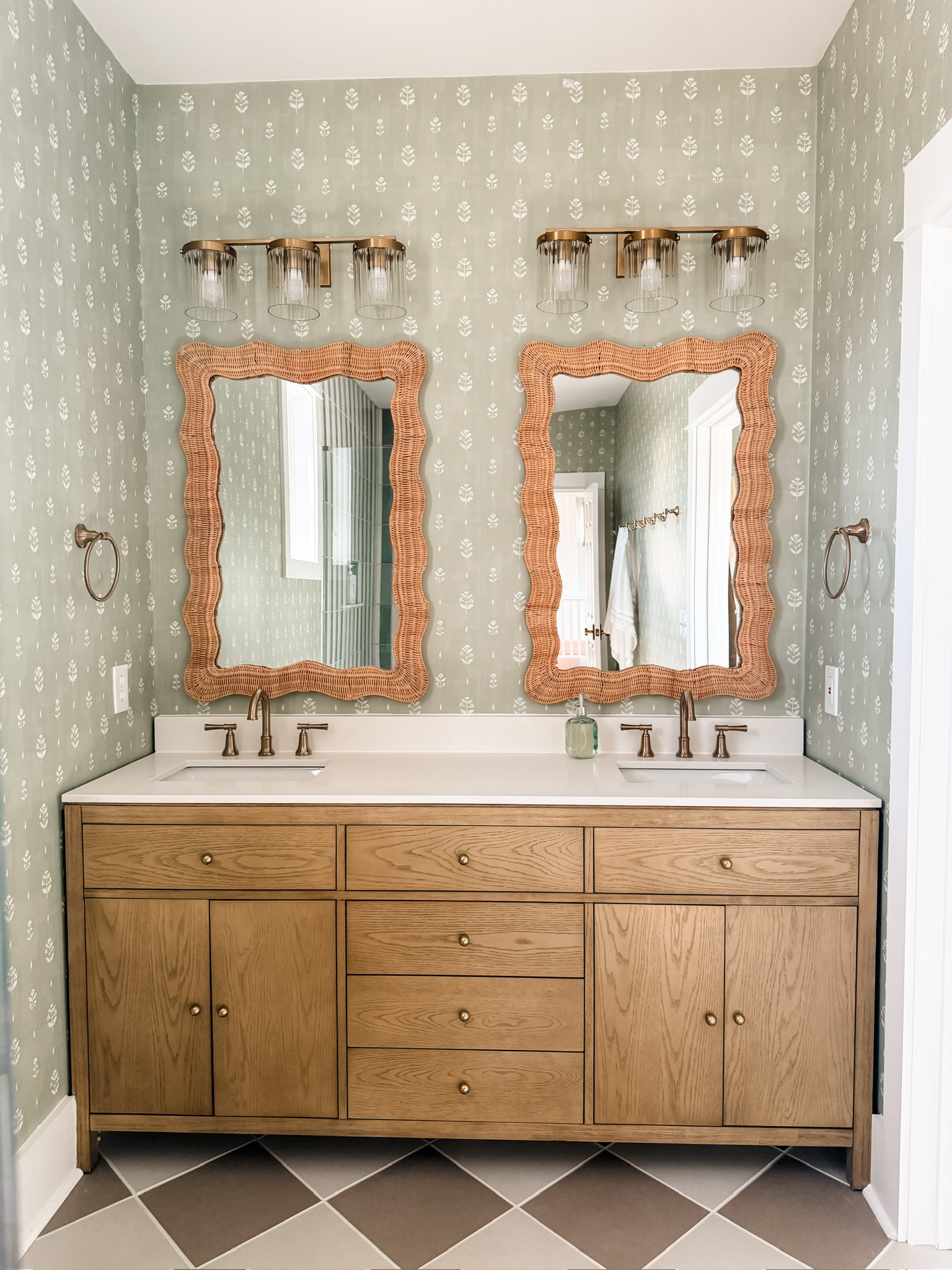 So excited to share pictures of our renovations at the beach house! This is one of the bathrooms, and I am obsessed! This wallpaper isn't linkable, but its's called "wildflower print paper" from Love vs Design!

Loverly Grey, home finds, bathroom inspo, home renovations, beach house, rattan mirror 

 #LTKHome