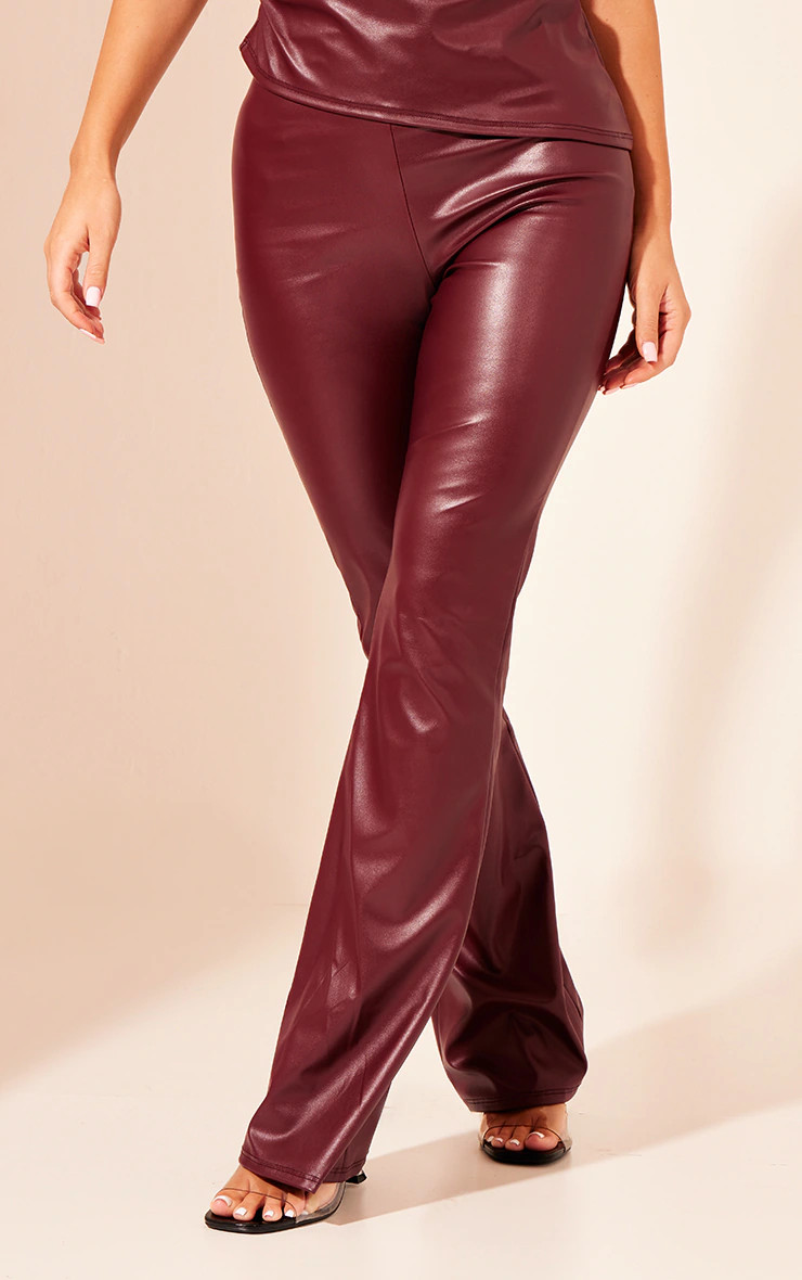 Dark Red Faux Leather High Waisted Flared Pants | PrettyLittleThing US