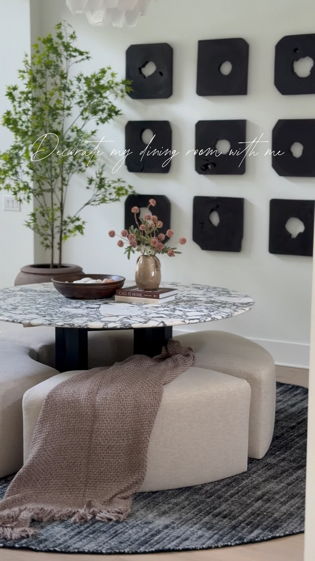 I finally feel like my dining room is complete, furniture and decor wise!! Just debating if I want to paint the wet bar cabinets! 

Dining room dinette moody earthy modern organic transitional marble dining table round table round rug planter home decor