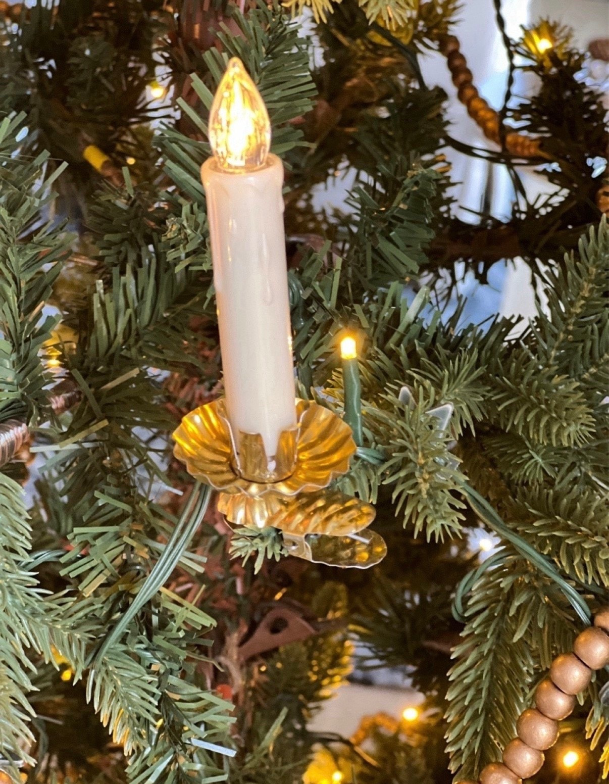 I love these battery operated clip on candles for our Christmas tree! I love them even more with these gold Christmas candle clips added to replace the green they normally have for a base. They add a nostalgic & vintage feel and keep my tree safe and pretty!

#LTKHoliday #LTKhome #LTKSeasonal