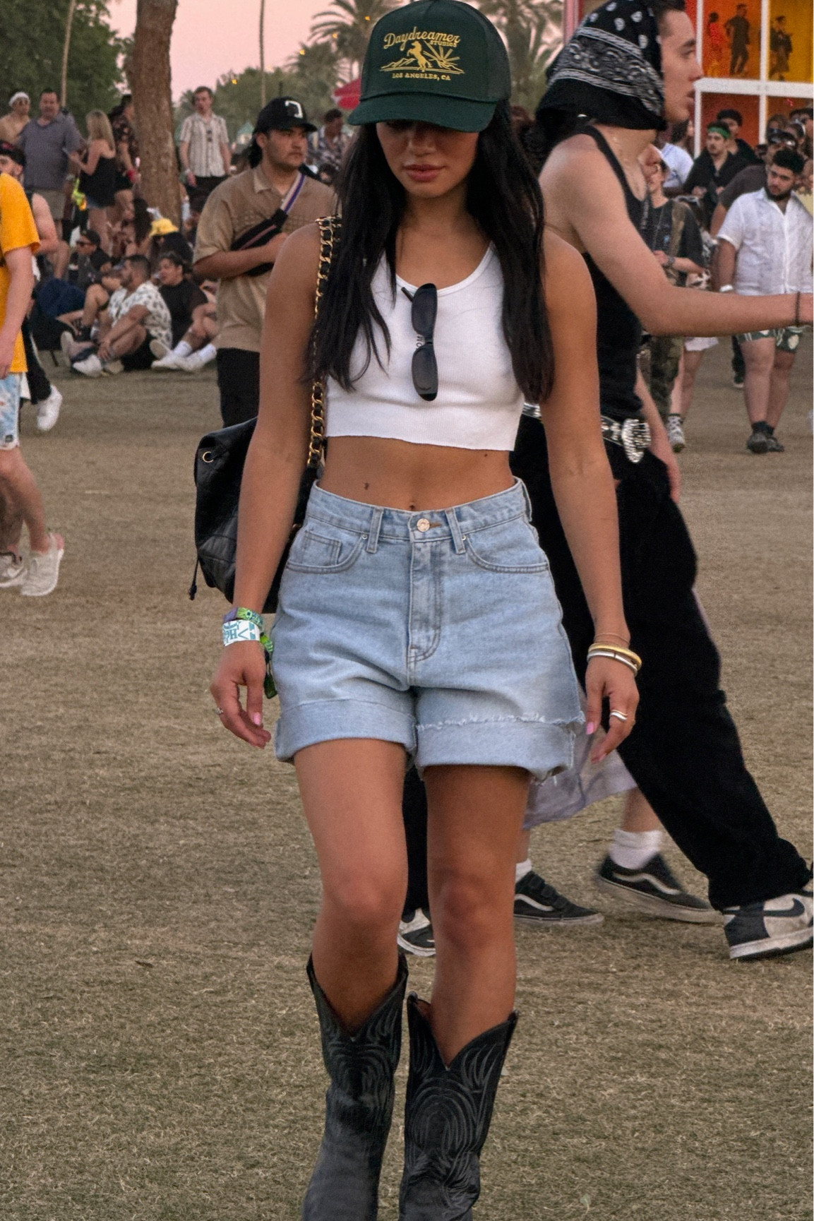 DAYDREAMER HAT CODE: michelle15 music festival style | casual ootd | white cropped tank, blue denim shorts, black cowgirl boots, green trucker hat 

#LTKstyletip #LTKfindsunder100

#LTKFestival