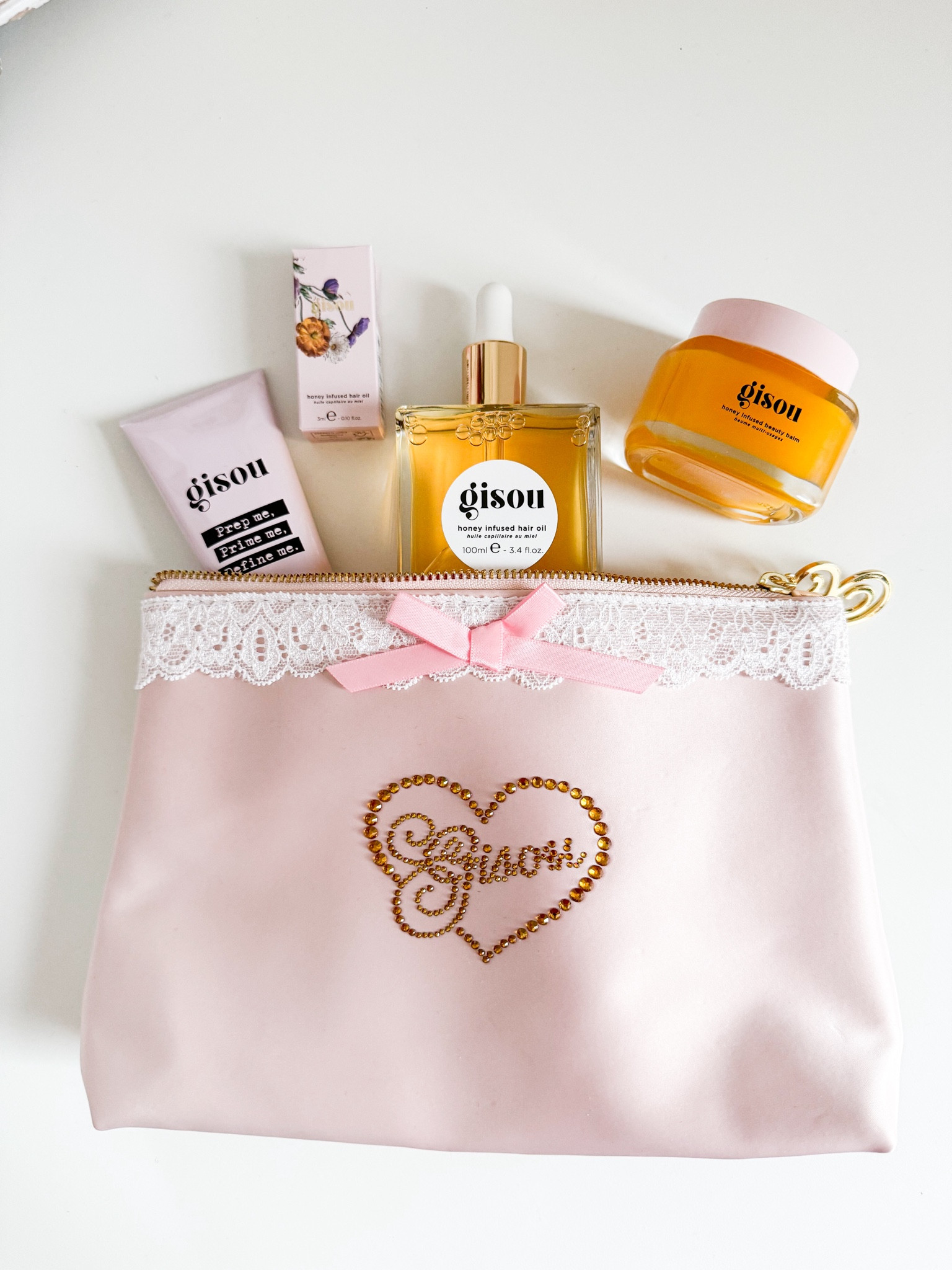 These Gisou products were inside the mystery box I bought in December and today I wanted to talk about my 3 favourite Gisou products!

Mask: I adore the mask! I use it both on wet and dry hair and it makes it so soft! When I use it on dry hair I mix it with the hair oil and leave it on for at least 20 minutes. On wet hair I leave it on for 5-7 minutes while on the shower. I don’t use it every week because I’m lazy (🙈) but because of the weather (and maybe the water in the area) my hair tends to get very dry in winter. This is when I stop being lazy and start using it at least once per week every week and works like a charm! You need to rinse it very very well though! 

Conditioner: The conditioner is probably my most used product of the brand. I use it every time I wash my hair and it leaves them soft without being  heavy on the hair. I noticed that you also need to rinse it very well, just like the mask. If my hair needs an intense moisture it makes a tiny difference but they don’t feel soft the day after without the mask.

Hair oil: A multi-purpose product that you need if you love hair oils. I’ve used it so far in any possible scenario. Wet, semi-wet or dry hair and my two favourite ways to use it is either in combination with the mask for a super intense moisturizing treatment or as the last product after I brow dry and style my hair. For a while I used it ok wet hair before I blow dried them but I noticed that it made oily quicker. On dry hair you can feel how much it needs so I find it better. Plus it gives an extra shine and tames frizzy hair!

I have many products of the brand and I really love them all but these 3 I buy them over and over again the last 2,5 years. Would you be interested in my hair routine?




#LTKeurope #LTKbeauty #LTKfindsunder50