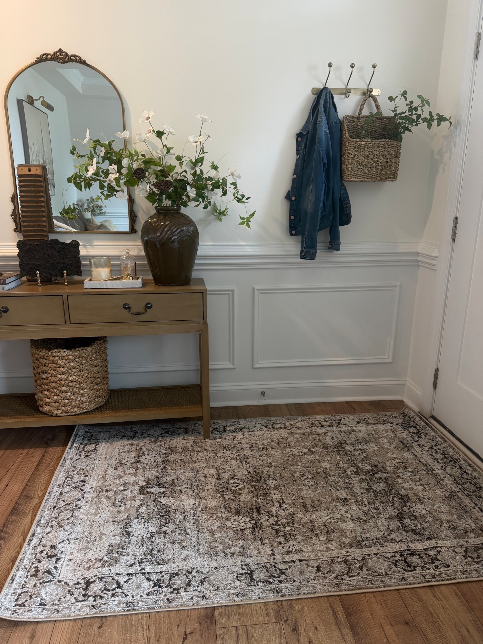 This entryway rug was the missing piece 🤎

I wanted something neutral but still interesting, and this one adds just enough pattern and warmth without taking over the space. It really ties in all the wood tones + textures and makes the whole entry feel more finished.

It’s low pile (perfect for high traffic + the door opening easily 🙌) and has that soft, vintage-inspired look I’m always drawn to.

Linking it here if you’re looking for a cozy, neutral rug that actually adds character 🤍