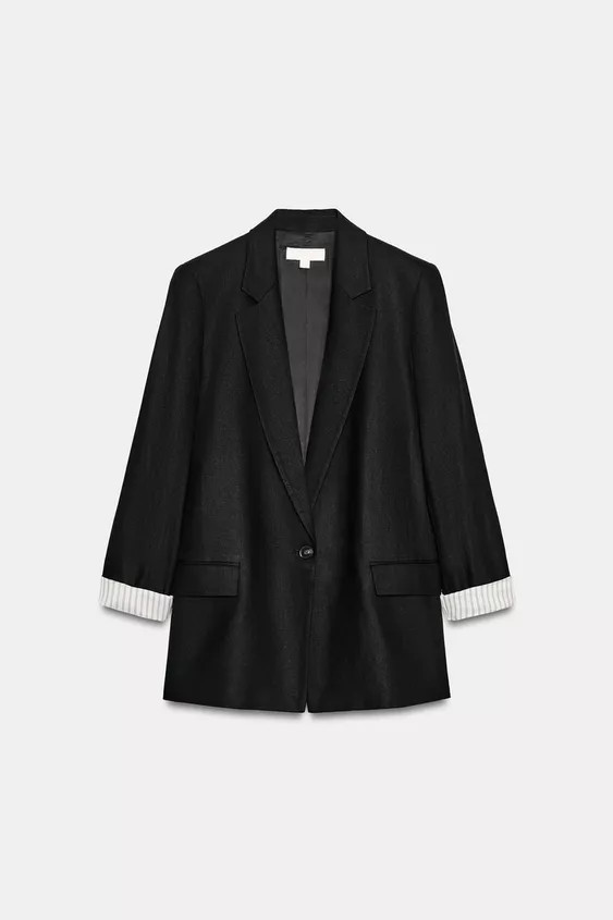 Blazer made with linen. Lapel collar and long sleeves with shoulder pads, finished with rolled cu... | Zara Canada