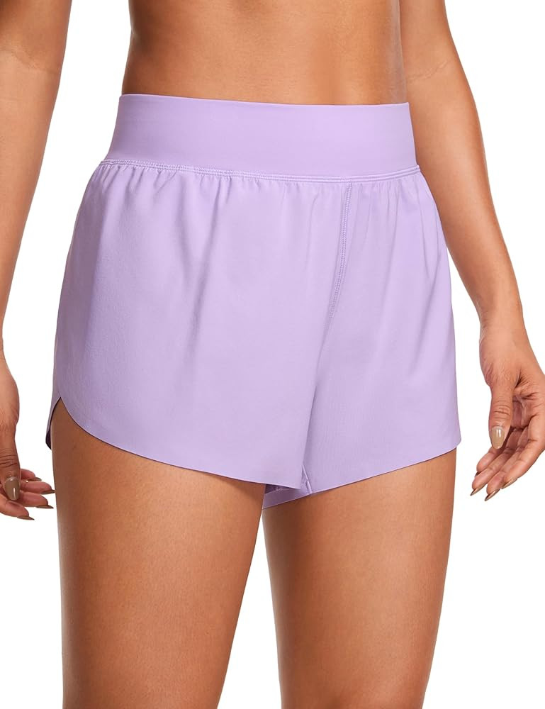 CRZ YOGA High Waisted Dolphin Athletic Running Shorts for Women 3" High Split Comfy Mesh Liner fo... | Amazon (US)