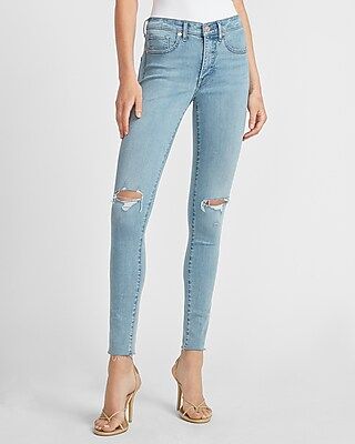 Mid Rise Ripped Raw Hem Skinny Jeans | Express