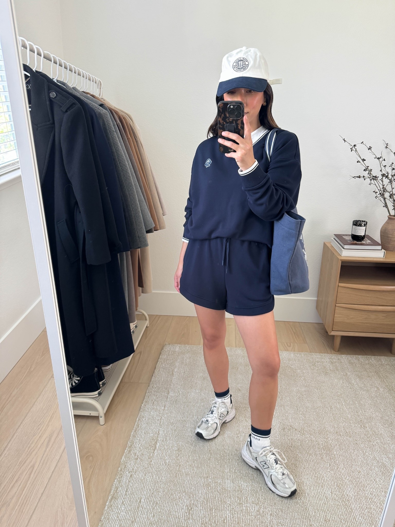 Easy athleisure outfits for mom-life. Another Varley set, but love the more sporty vibe. So easy to run around in these, but love that they still make me feel pulled together. 

Varley pullover small
Everlane tee medium
Varley Ollie shorts small
Varley socks
New Balance 530's 4 mens
Varley tote
Gap hat

Spring outfits 2026, mom style, athleisure 

#LTKPetite #LTKmomlife #LTKActive