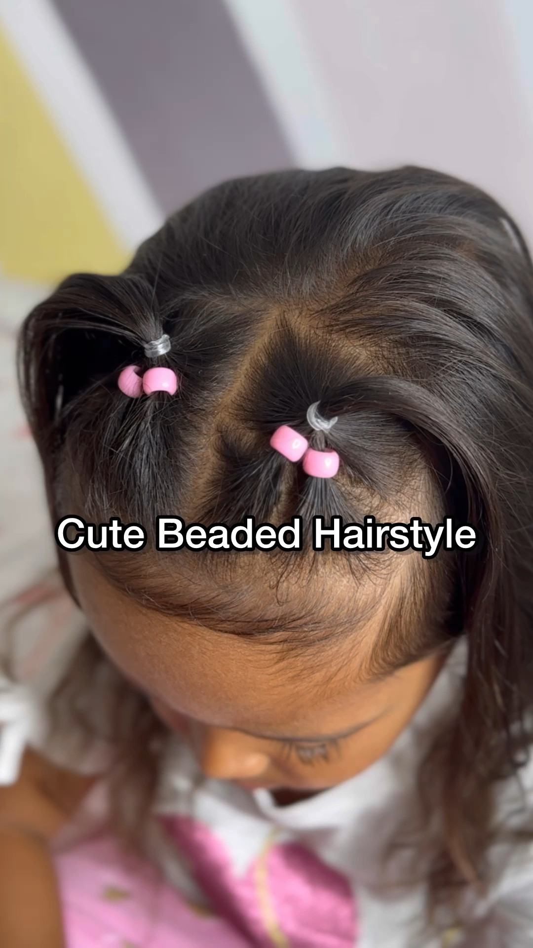 Simple but cute beaded hairstyle.