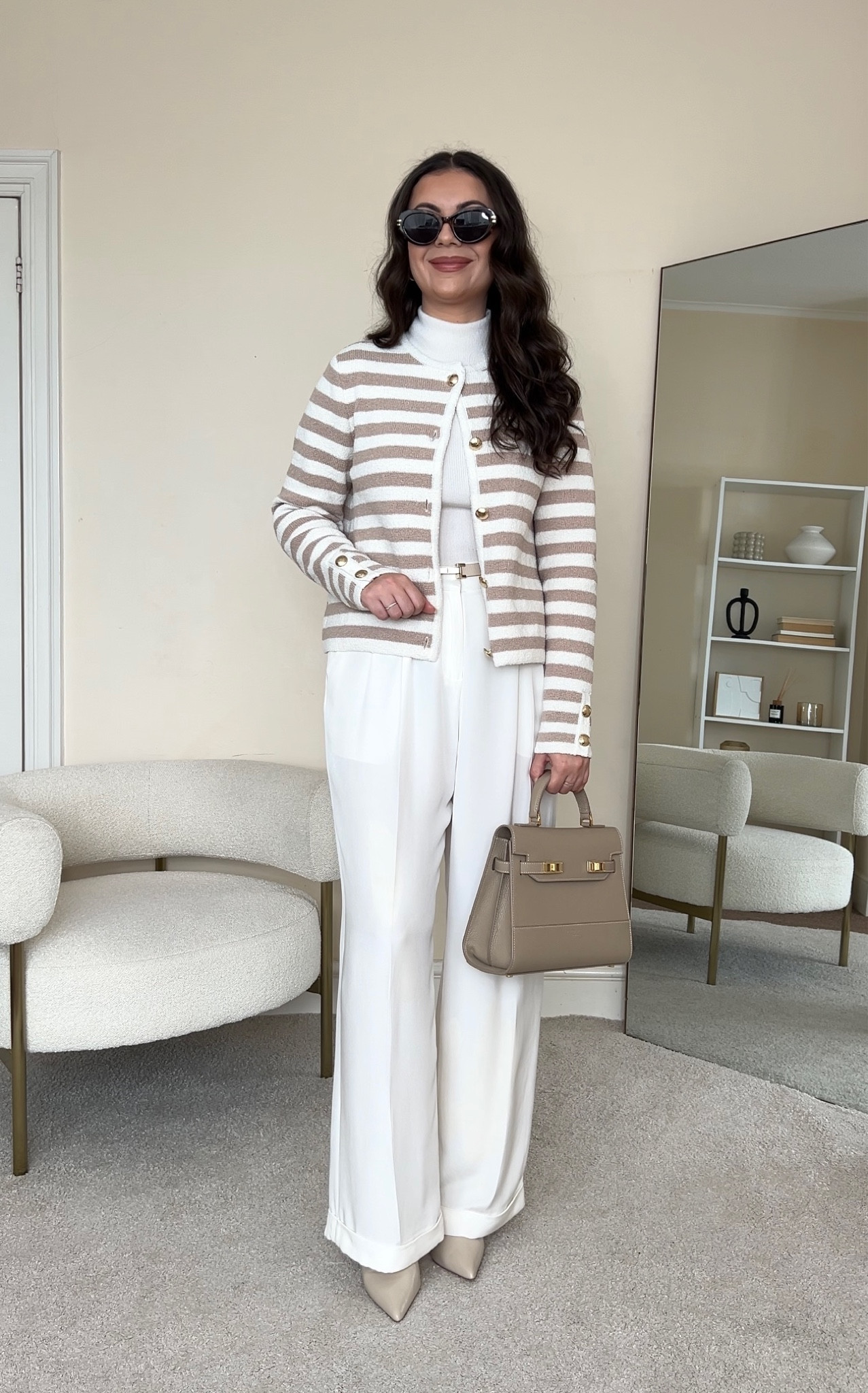 Transitioning to lighter colours, and lighter layers. Neutral Winter to Spring transitional outfit.
Roll neck is from Mango, wearing size S. Cardigan is from H&M, wearing size S. Trousers are from LilySilk, wearing size UK14. Boots are from Dune. Handbag is from Teddy Blake and couldn’t link here on LTK, so I’ve linked similar .

#LTKstyletip #LTKfindsunder100 #LTKeurope