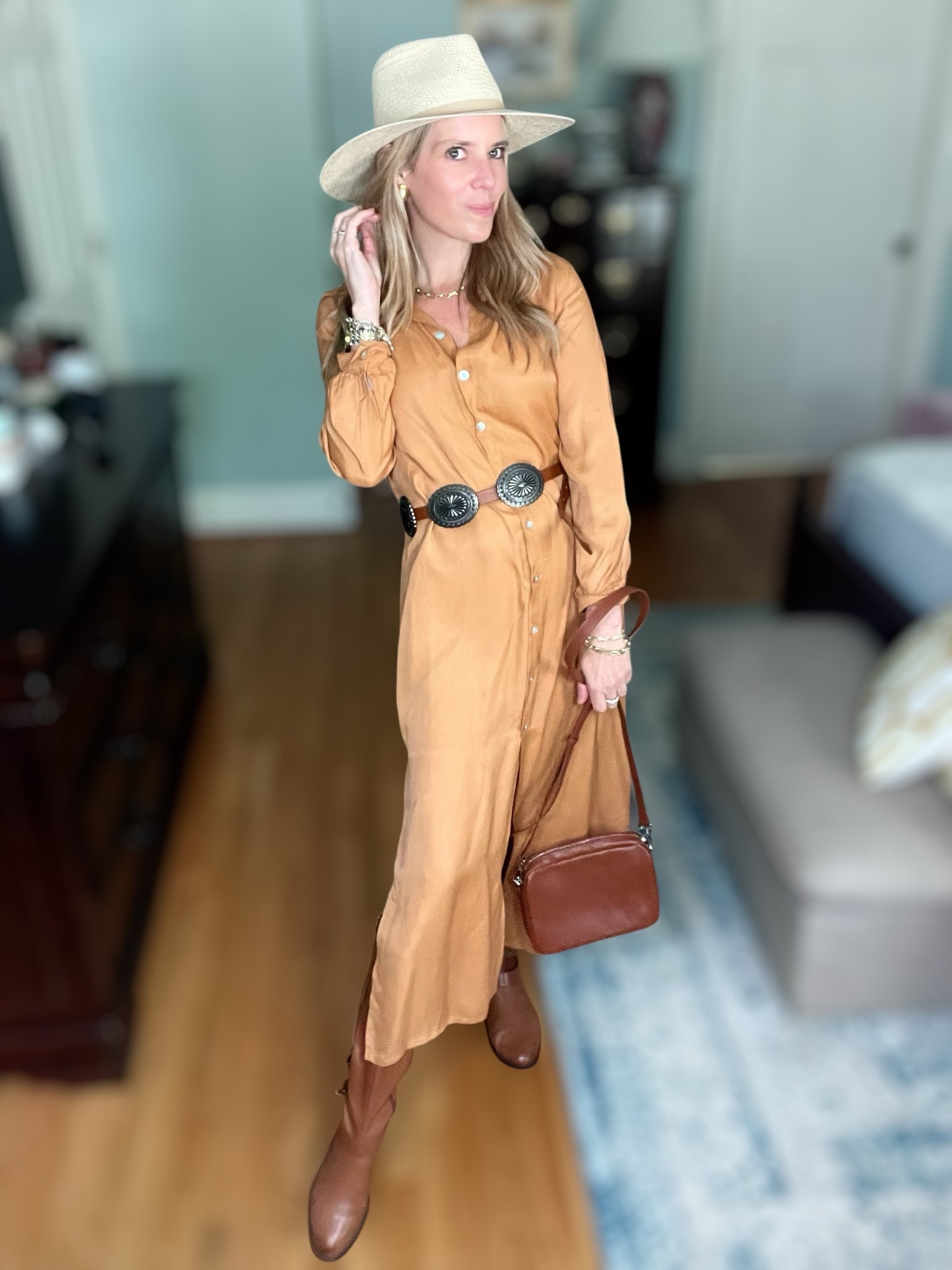 
🤠 Use code PREPPYREBEL for 10% off my Melinda Maria jewelry! 💎

Western-inspired with a glam twist ✨ This Amazon shirt dress is a fall must-have in the prettiest warm amber tone (wearing size XS). I styled it with tall cognac boots, a vintage-style concho belt, and a neutral rancher hat for the perfect elevated cowgirl vibe. 🐎🤎

Finished it off with a structured saddle bag, classic gold accessories, and my go-to Melinda Maria jewels—because a little sparkle never hurt a western look! 💫

#fallfashion #westernstyle #amazonfinds #shirtdressstyle #cowgirlchic #melindamaria #melindamariajewelry #ltkwestern #ltkfallstyle #ranchergirl #bootsanddresses #preppywildwest #ltkstyle

#LTKOver40 #LTKFindsUnder100 #LTKFindsUnder50