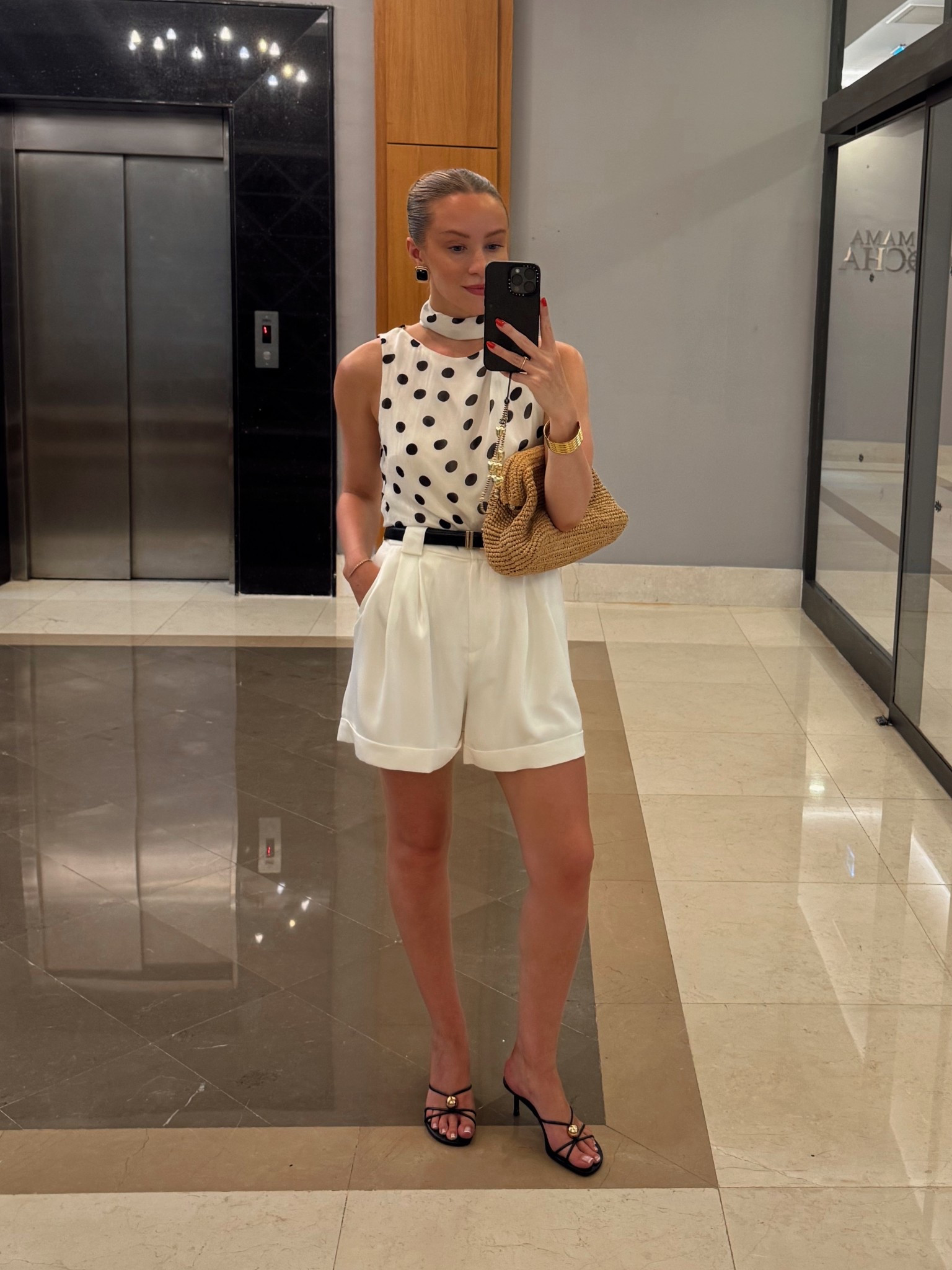 South of France outfit, white tailored shorts, polka dot blouse, raffia clutch bag, heel sandals, summer evening outfit 

#LTKsummer #LTKeurope #LTKdatenight