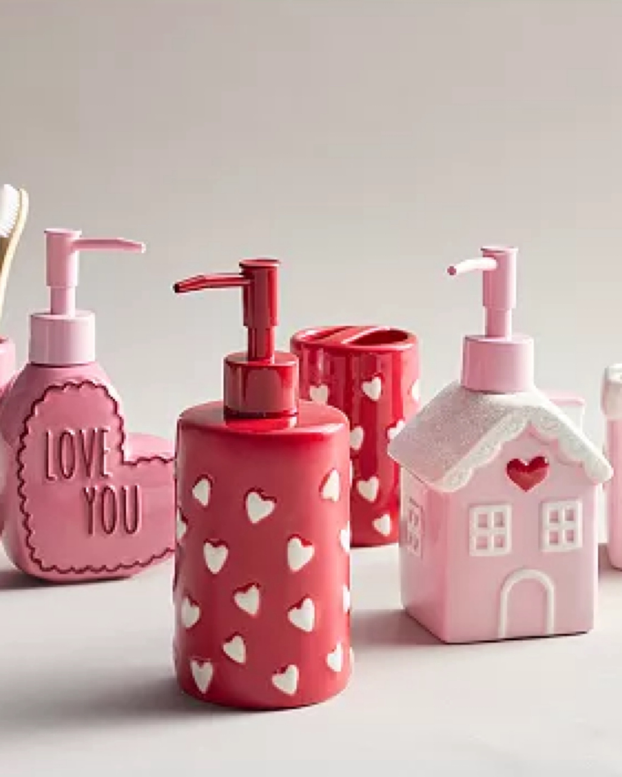 Give your bathroom and kitchen a charming Valentine refresh with this darling heart shaped soap pump, pink house soap pump or red heart print soap pump.  Matching toothbrush holders and cute bathroom rugs also available.

#LTKhome #LTKSeasonal
