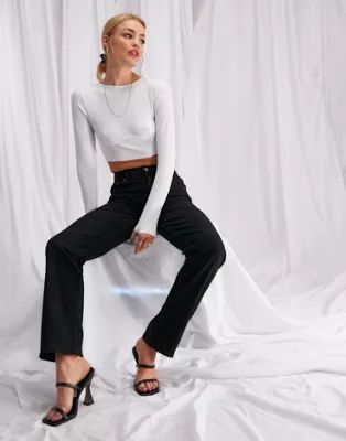ASOS DESIGN mid rise 90s straight leg jeans in black | ASOS (Global)