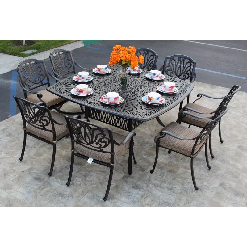 Kristy 9 Piece Dining Set with Cushions | Wayfair North America