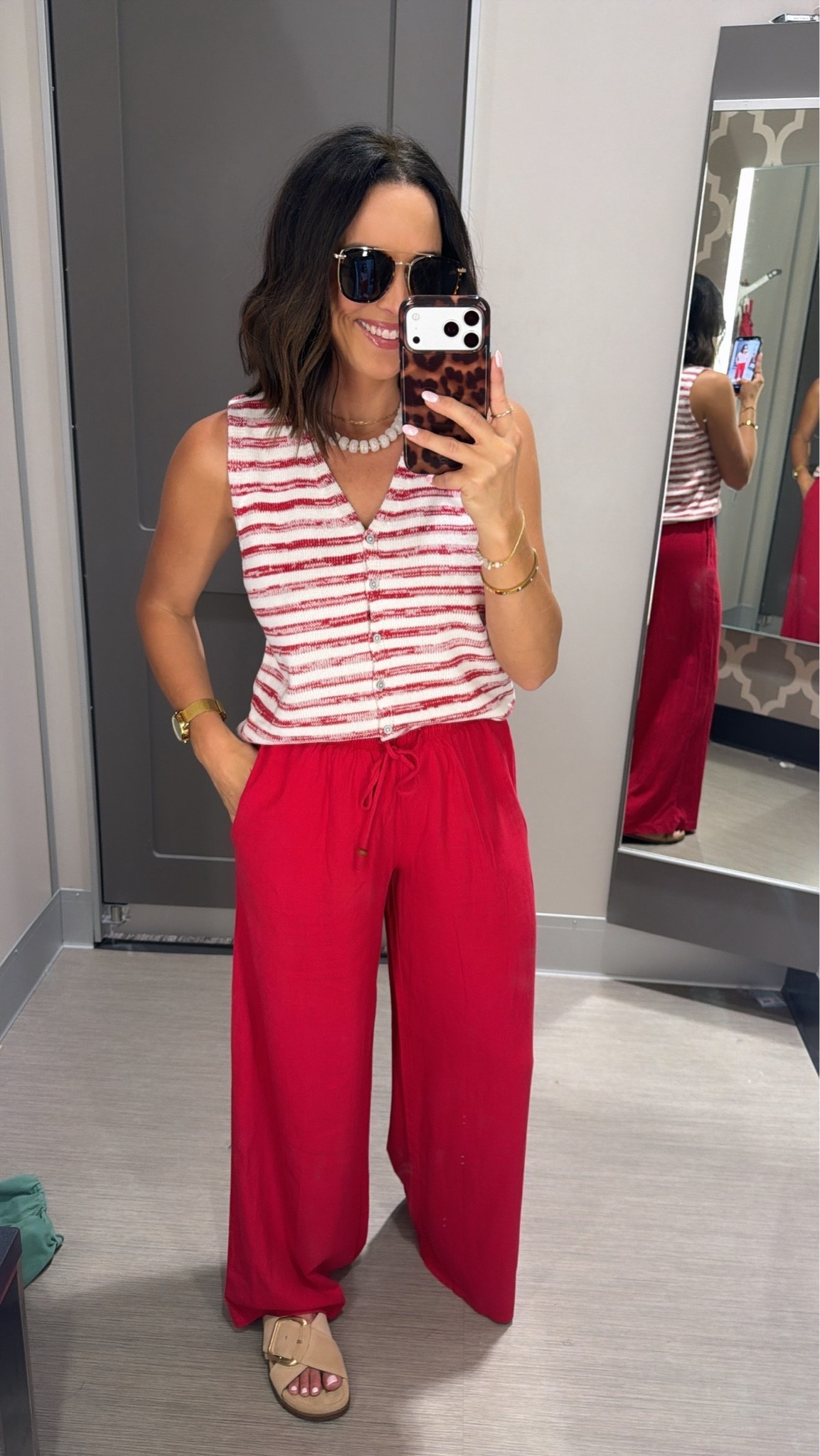 Love this❤️ The flowy pants are so comfortable and flattering, and I love how the striped sweater tank makes the whole look feel a little elevated. One of those outfits that looks expensive but feels like you’re wearing pajamas.

Size XS, 5’3 for reference

#LTKStyle #LTKFinds #TargetStyle #SummerStyle #VacationOutfit #ResortWear #WideLegPants #AffordableFashion #OOTD #LTKUnder50