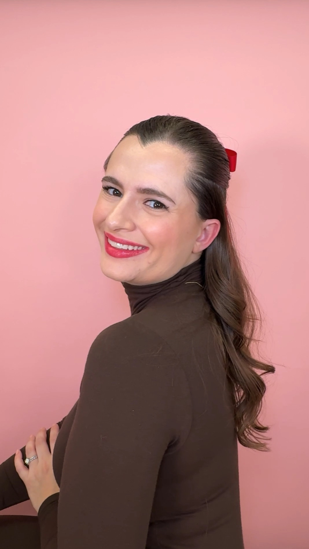 Easy holiday hairstyle! A half up slick back with a cute red bow to top it all off  

#LTKBeauty #LTKHoliday #LTKFindsUnder50