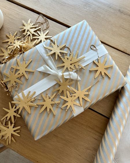 Kat Jamieson shares Christmas decor. Gifts, gift, wrapping paper, holidays, seasonal, festive. 

#LTKSeasonal #LTKHoliday #LTKhome