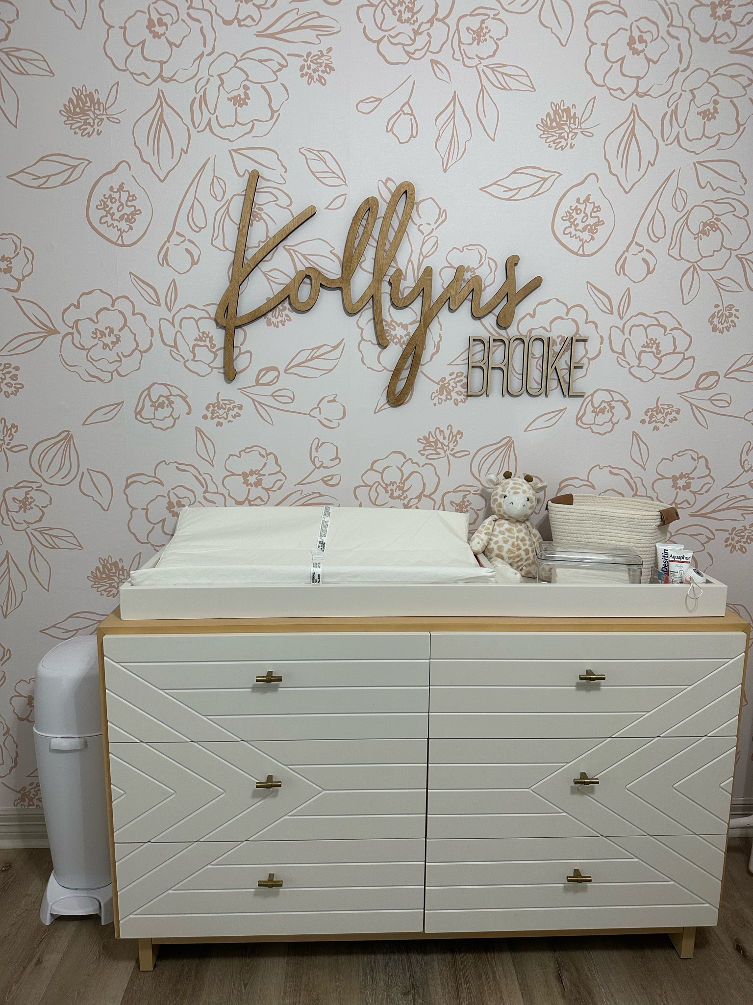 Nursery -
Dresser / changing table, changing pad, organizer bins, wipe dispenser, basket, diaper pale, and name sign

#LTKhome #LTKbaby