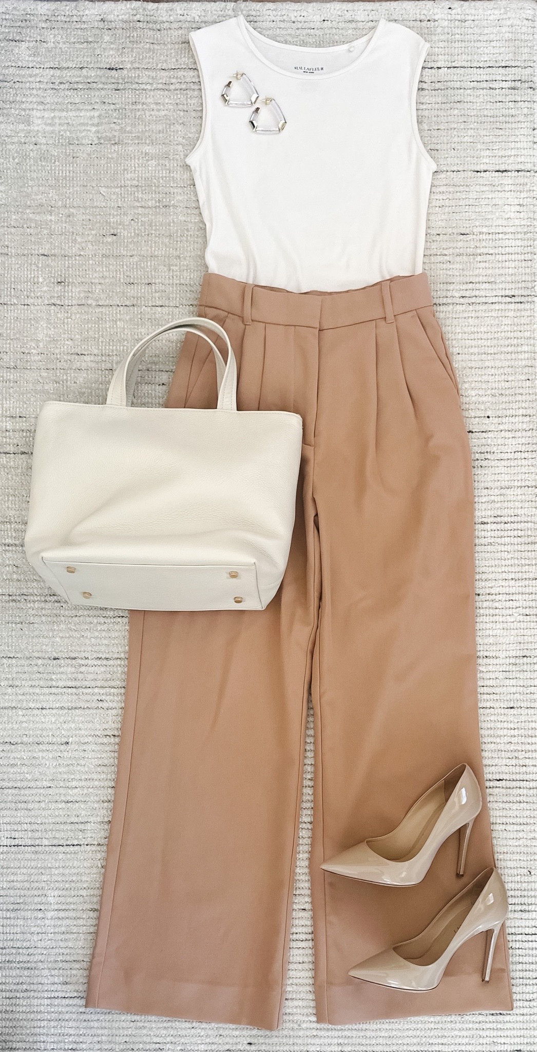 Business casual workwear or fall outfit with tan trousers paired with white cotton top and pumps for a classic look! Can be dressed up more professionally with a blazer. Linking outfit, shoes, and similar items 

#LTKworkwear #LTKstyletip #LTKSeasonal