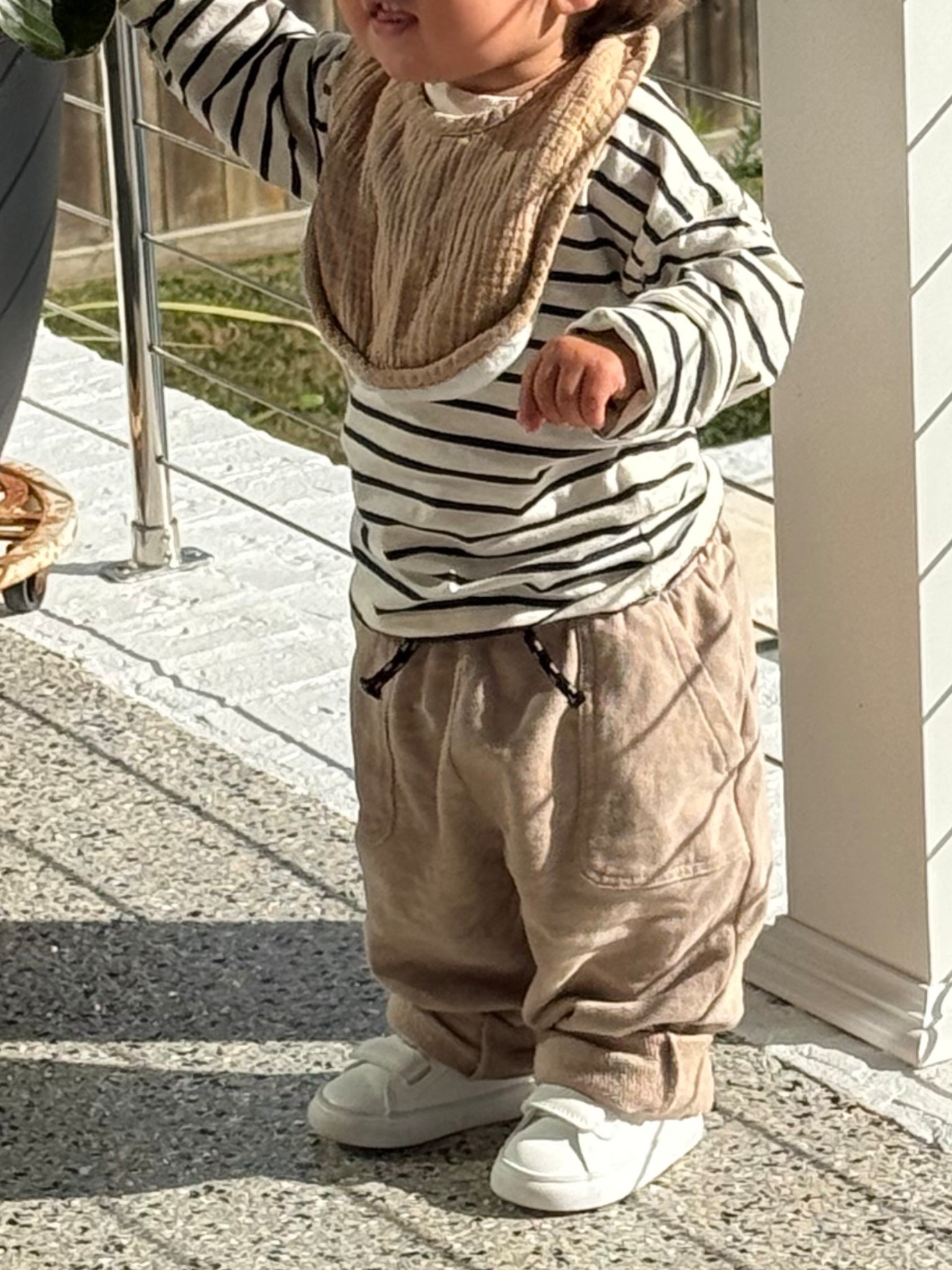 Minimalist toddler outfit idea | mixed some neutral tones by pairing these tan sweatpants with a white and black striped long sleeve and white sneakers for a comfy and stylish look

#LTKBaby #LTKKids #LTKCyberWeek