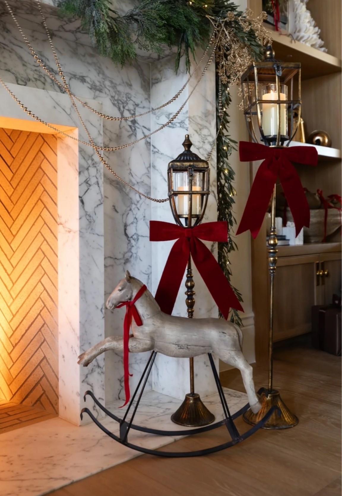 Vintage horse holiday rocker and lanterns.

#LTKSeasonal #LTKHome