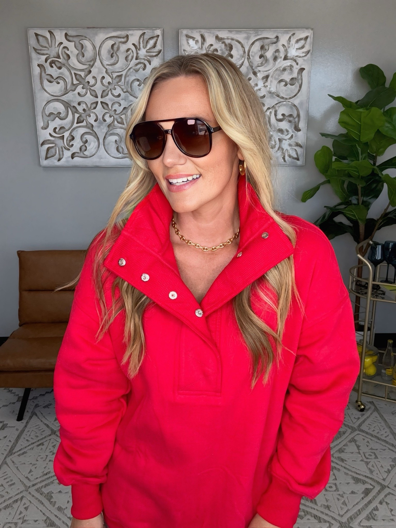 The oversized snap collar and relaxed fit make this pullover the perfect layer for travel days, morning walks, coffee runs, and casual weekends. The vibrant pink color makes a statement while the structured collar and gold accessories keep the look polished and elevated.

Sizing:
• Pullover: Medium
• Sunglasses: One Size

pink pullover, snap collar pullover, oversized sweatshirt, casual outfit, travel outfit, airport style, weekend style, Sojos sunglasses, oversized sunglasses, athleisure style, elevated casual outfit, comfortable fashion, everyday style, cozy outfit, Amazon fashion, statement sunglasses, women’s fashion, casual chic style, AudrieDollins

#LTKActive #LTKOver40 #LTKfitnessgoals