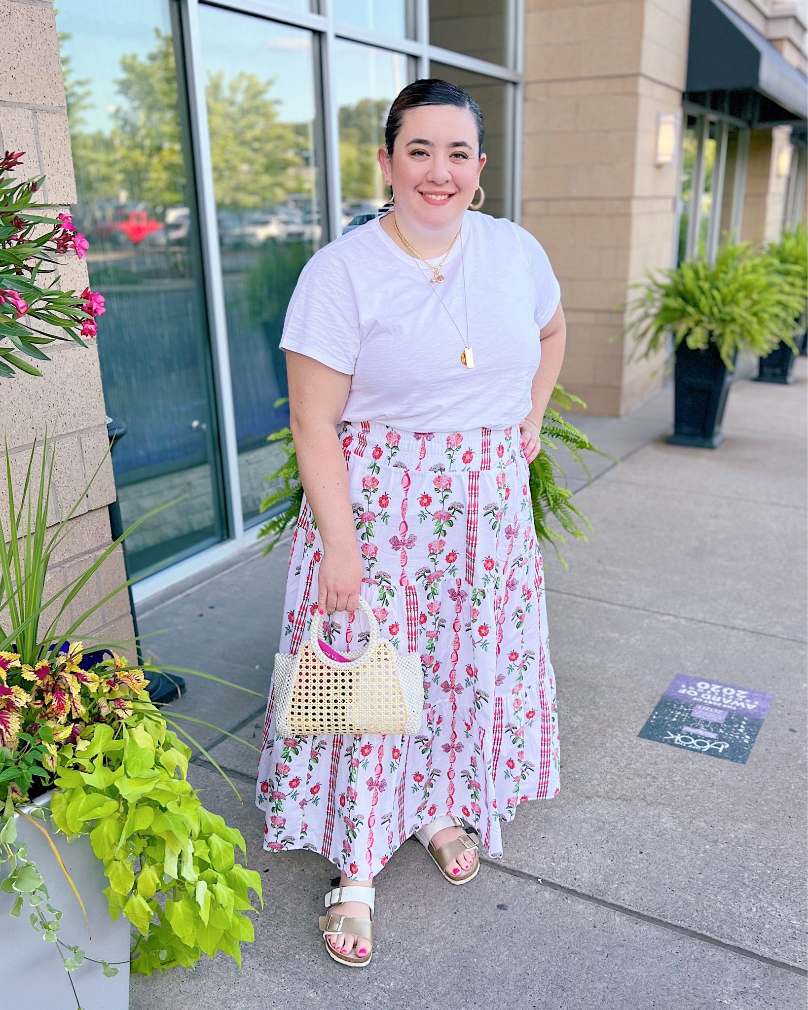 Casual summer outfit with maxi skirt and white t-shirt 🌺 grand Millennial outfit, cottagecore skirt, cottagecore outfit, classic style, caned bag, raffia bag, raffia bag with pearls, Birkenstock sandals, gold necklaces, gold hoop earrings 

#LTKcurves #LTKSeasonal #LTKmidsize