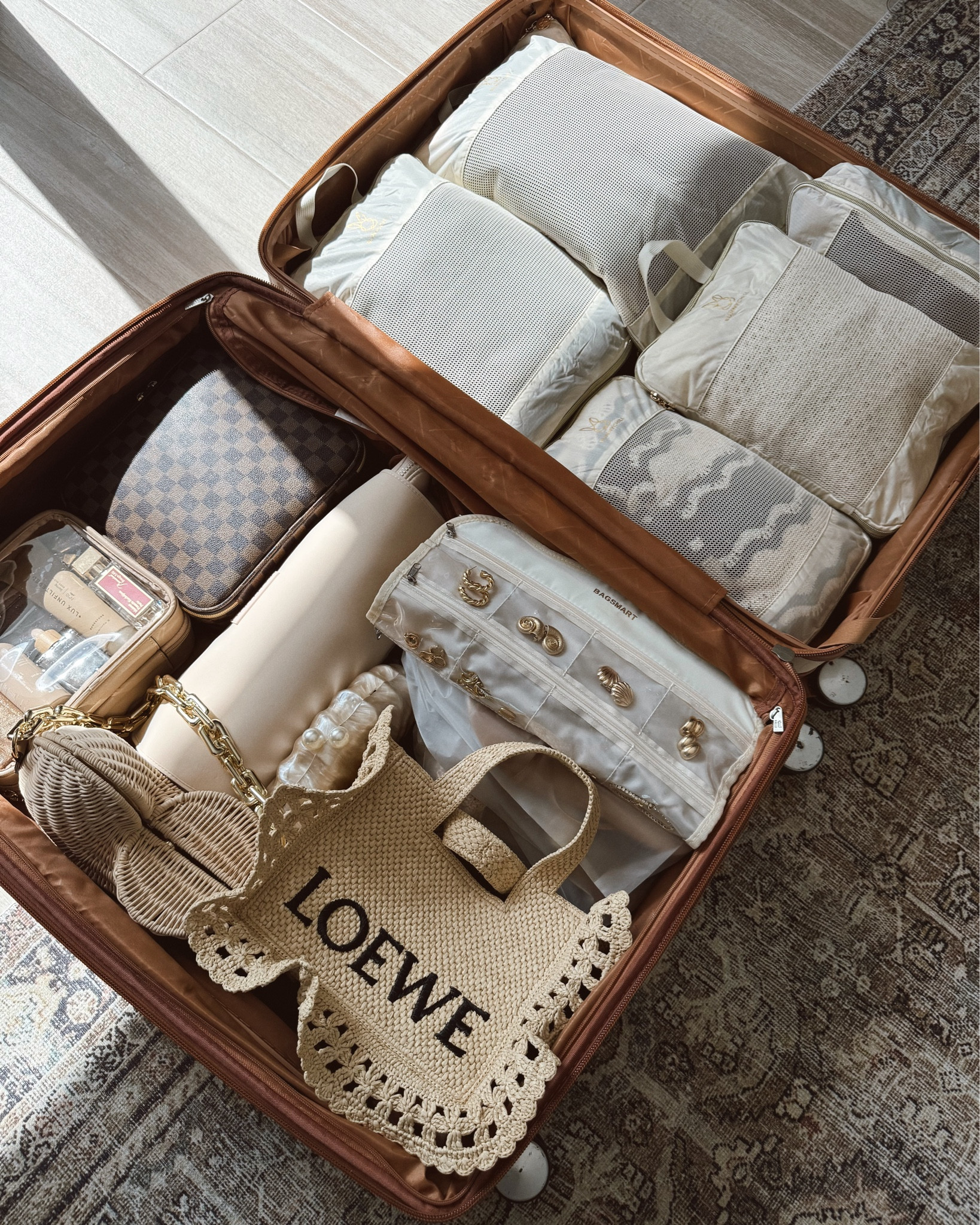 Packing Essentials that I swear by 🤍 

Hanging jewelry organizer:
it’s double sided, easy to roll up  + hang during vacay 

Sunglasses organizer:
Hard case so it protects your Sunny’s and holds multiple pairs!

Compression packing cubes: New to me!
these compress and save so much space! 10/10

Hair tools case: fits all the things & also can be used as a hot tool mat

Clear toiletry case:
I love that it has multiple compartments and clear so easy to see what’s inside 

Fav travel makeup bag:
The hard case protects your makeup from breaking,
Has compartments inside that you can personalize and a spot for brushes

Shoe bags:
keep dirt, dust and sand out of your bag 

#travel #packing #packingessentials #organization #jewelrybag #makeupbag #packingcubes #hairtoolsorganizer #steamer #compressioncubes #amazon #amazonfind #amazonmusthaves #toiletrybag #suitcase #carryon #luggage #walmartfind 

#LTKTravel #LTKFindsUnder50 #LTKSummerEdit