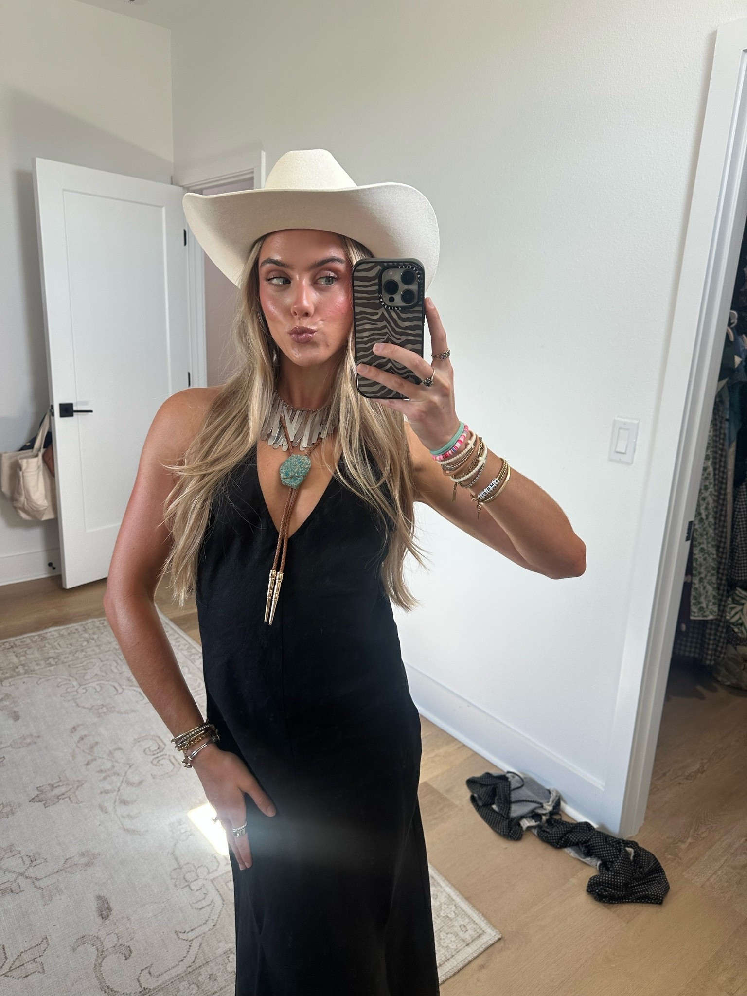My outfit for Chris Stapleton love a good country concert outfit. My dress is size xs @jcrew love the linen fabric and the halter neck tie then I added some accessories to make it more fun so my silver necklace which is Walmart!! And my bolo tie is a custom piece and my new @Wrangler cowboy hat and @Freebird Stores cowboy boots.

#LTKootd #LTKdayinmylife #LTKSeasonal