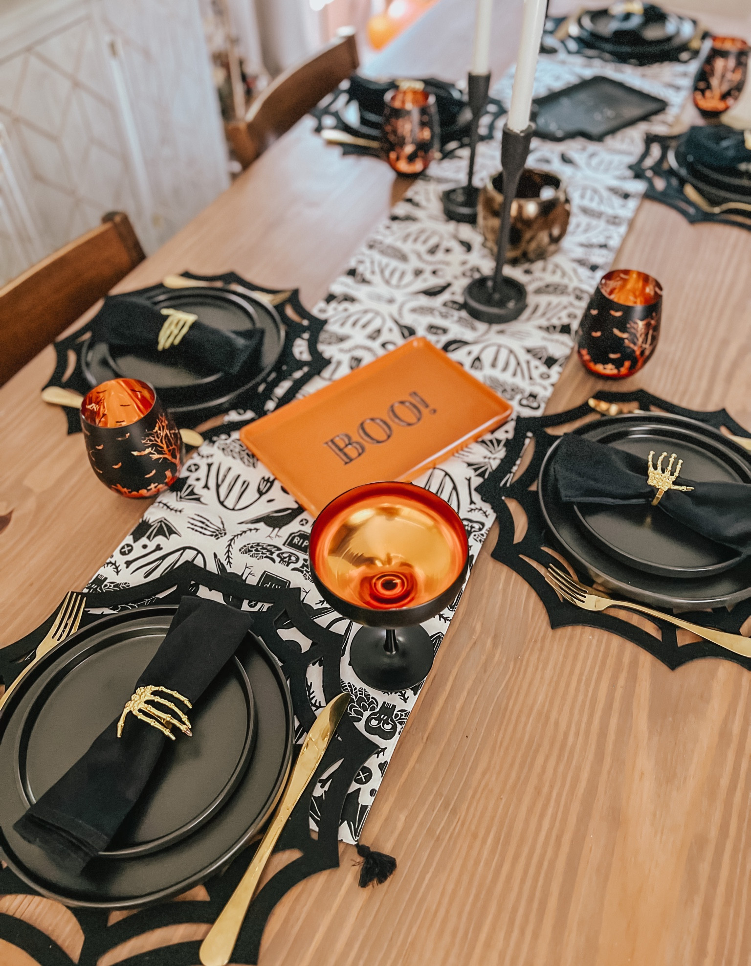 Spooky tablescape 🕸️ 👻 



Skeleton napkin rings | Halloween entertaining | dinner party | black plates | gold flatware | dining table runner | murder mystery 

#LTKHalloween #LTKhome #LTKSeasonal