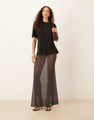 ASOS DESIGN mesh sheer maxi skirt in black polka dot | ASOS (Global)