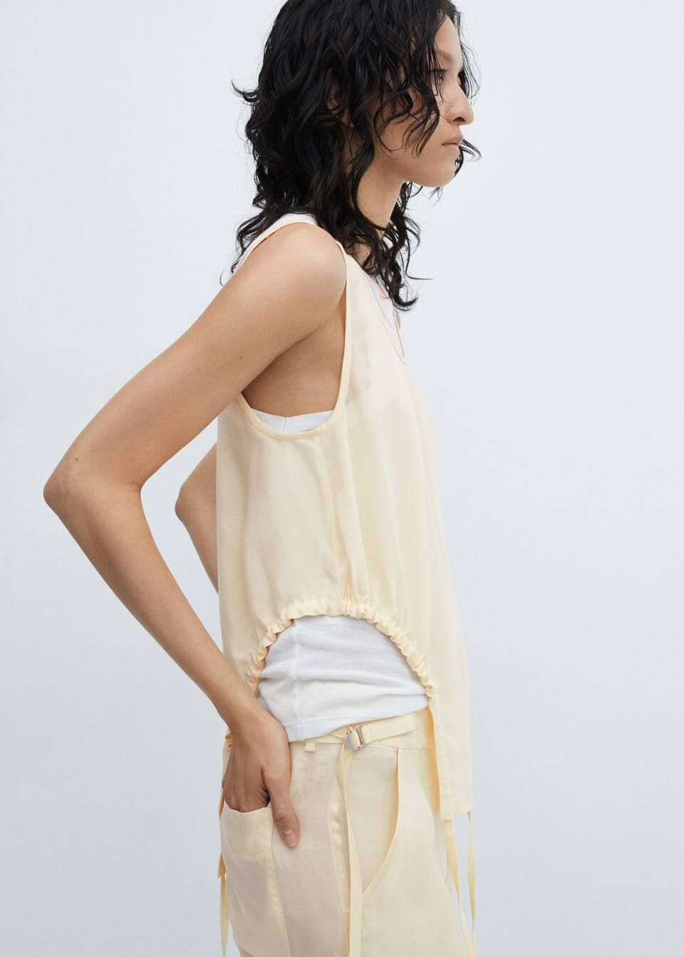 Semitransparent top with side pleats | MANGO (UK)