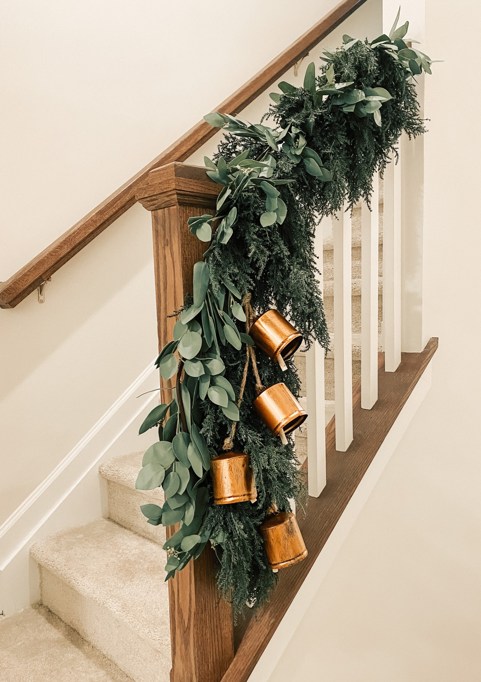 Small banister garland | holiday decor | neutral home | Christmas decor | gold bells | railing decor 

#LTKhome #LTKunder100 #LTKHoliday