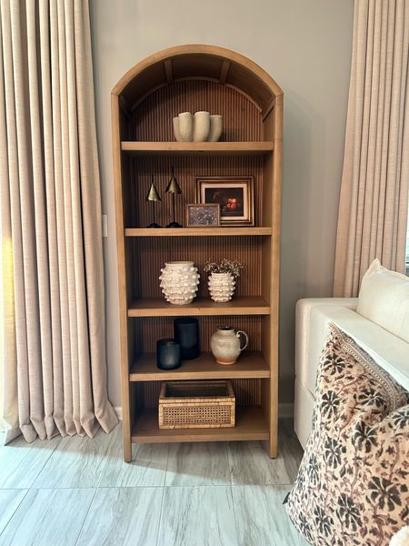 Found an identical bookshelf to mine on MAJOR SALE! My exact one is still out of stock- linked both down below for you! Arch bookshelf, living room, target sale 

#LTKSaleAlert #LTKHome