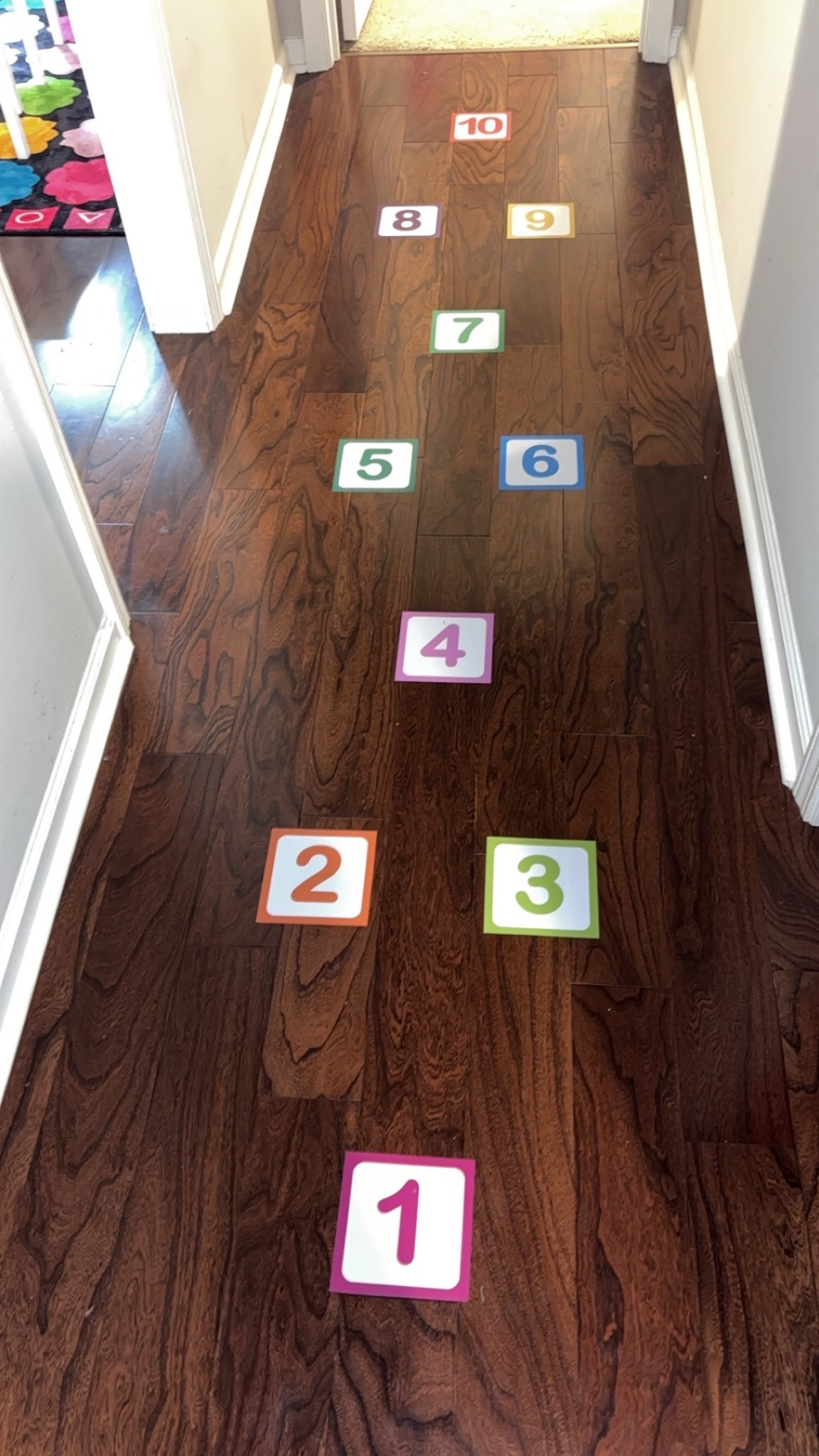Hallway hopscotch! Such a fun way for kids to play inside, especially on rainy days ⛈️

#LTKKids #LTKHome #LTKFindsUnder50