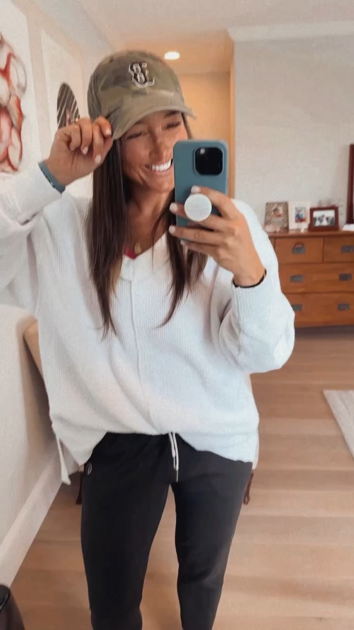 Spent today on the sidelines in this comfy sweater from aerie and a pair of black joggers. I paired this simple look with one of my favorite pair of studs and a baseball cap. 

Comfy casual, comfy outfit, comfy sets, momfit, aerie, aerie sweater, baseball hat, baseball cap, black joggers, vuori, Vuori joggers, casual style, mom style, baseball mom outfit, athletic mom, weekend outfit, travel fit, travel day, travel outfit for moms, comfy Saturday outfit, simple style, simple fashion, fashion over 30, fashion over 40, fashion over 50, airport fit, travel fit, mom fit, basic fit, comfy fit, baseball fit, gameday fit, Saturday fit, game day outfit

#LTKstyletip #LTKunder50 #LTKfit
