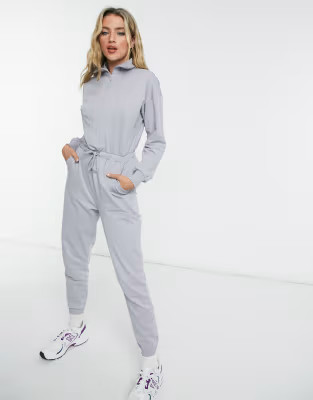 ASOS DESIGN zip front sweat jogger jumpsuit in washed blue | ASOS (Global)