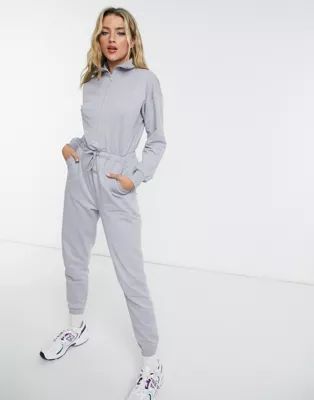 ASOS DESIGN zip front sweat jogger jumpsuit in washed blue | ASOS (Global)