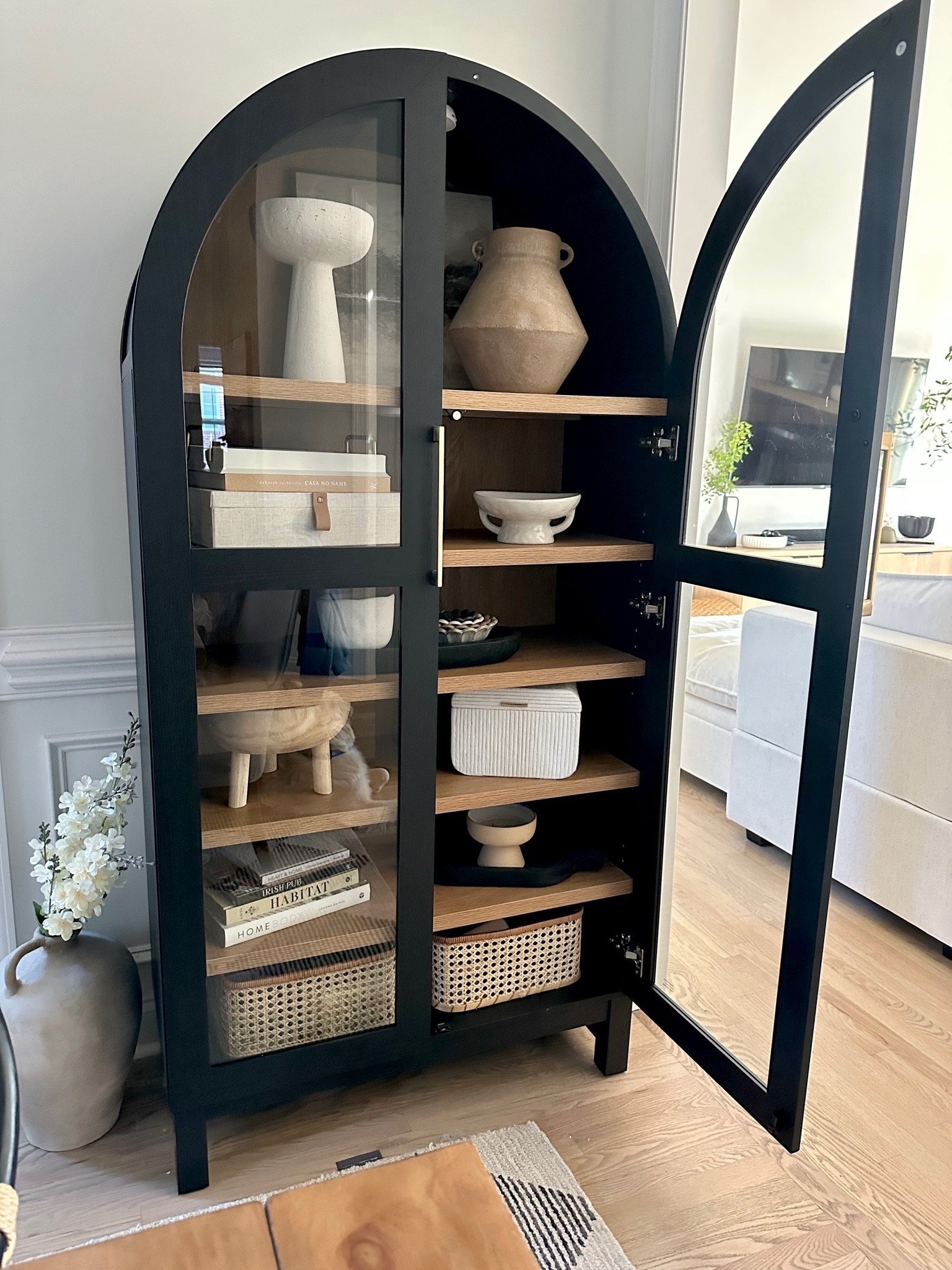 Back in stock! The viral walmart Juliet arch cabinet.  Both colors in stock! 

Comes in either black, like shown here, or solid oak color.

This is hands down one of my all time favorite purchases.  Amazing quality for the price - just under $400


Curio cabinet, affordable home finds, affordable furniture, arch cabinet, glass cabinet, walmart home 



#LTKSaleAlert #LTKHome