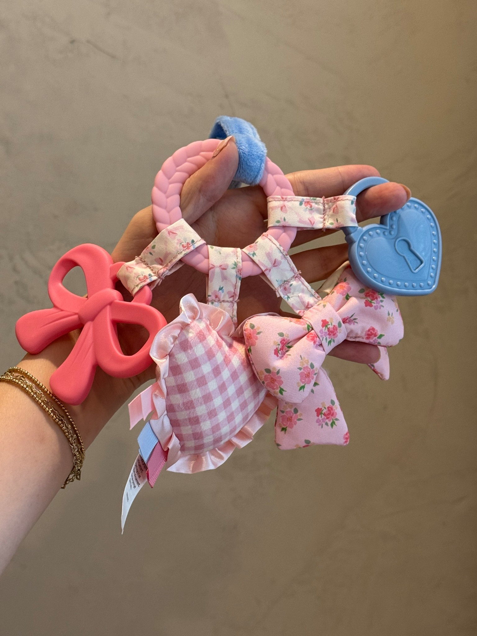 The CUTEST baby toy!! Itzy Ritzy forever has my heart 🤍 

Aesthetic toys, girl toys, baby toys, baby teethers, teething ring, car seat toys, LoveShackFancy baby, baby girl toys, first birthday gifts

#LTKmomlife #LTKBaby