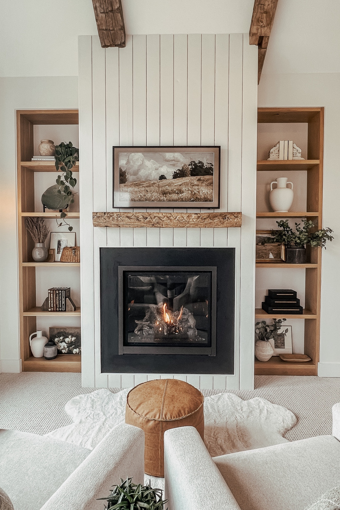 Bedroom sitting area inspiration 

Gas fireplace, built in shelves, master bedroom, master sitting area, faux sheepskin rug, ottoman, xl chairs, pottery barn chairs, comfy reading chairs, round side table, brass side table, plants, books, book ends, antique basket, carved wood bowl, black stacking boxes, antique vase, european antique, pottery bowl, frame TV, reclaimed wood mantle, wood beam, fireplace mantle, 

#LTKHome #LTKVideo