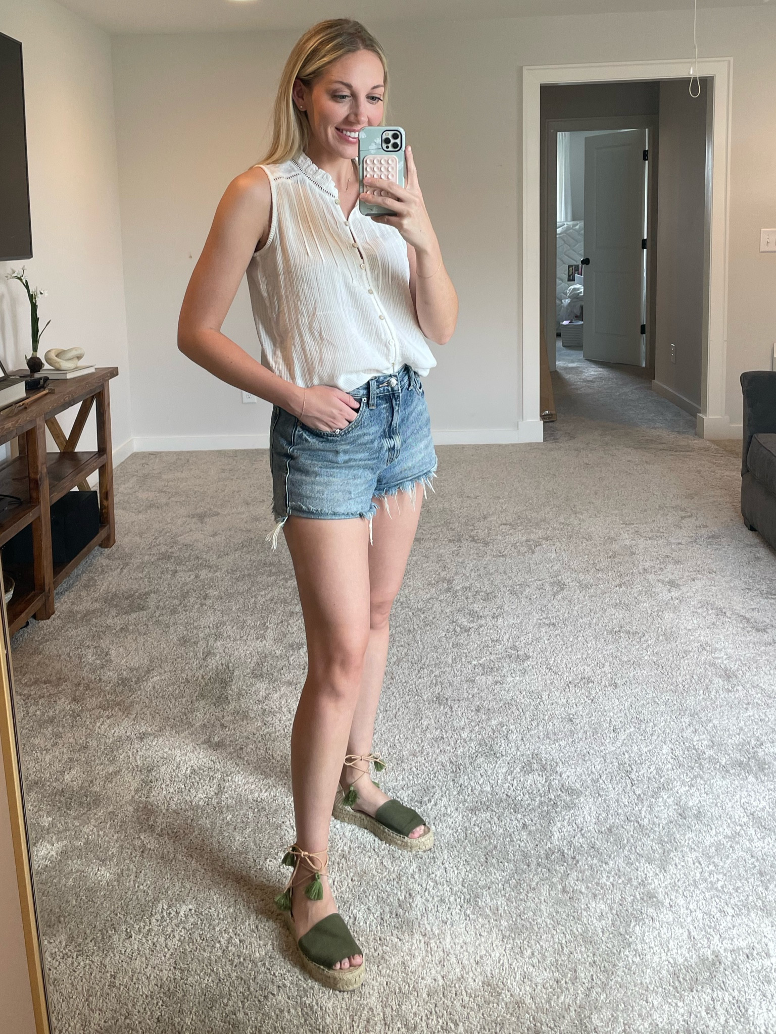 Sleeveless top with so much detail. A great summer basic to have. Wearing the small. @fahertybrand discount code MEREDITH20 for a limited time to save! 

#LTKU #LTKFind #LTKSeasonal