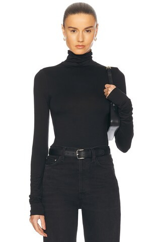 Eterne Fitted Turtleneck Top in Black - Black. Size L (also in M). | FWRD 